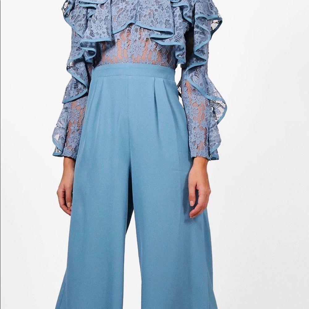 Blue lace jumpsuit! Never worn with tags still on.